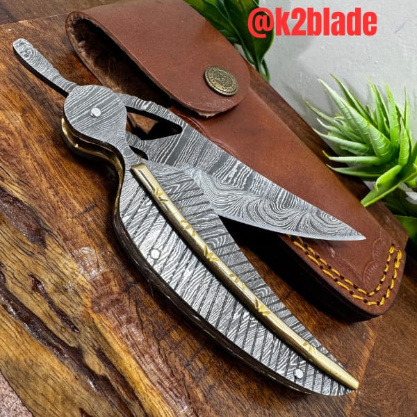 Feather folding knife