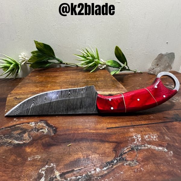 Ring-pommel cleaver