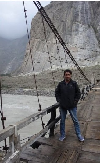 Suspension bridge over a river in the Karakoram mountains, northern Pakistan