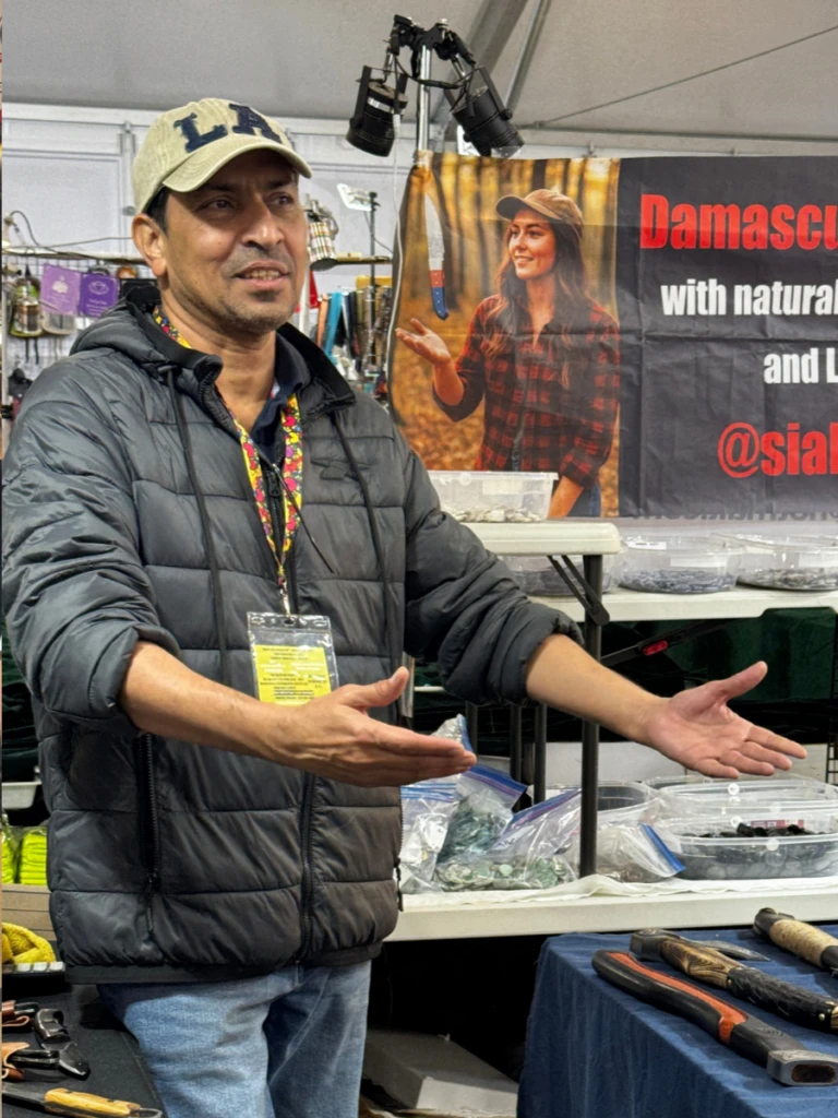 MJ, founder of K2 Belts, at the trade-show booth