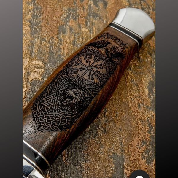 Norse compass handle design