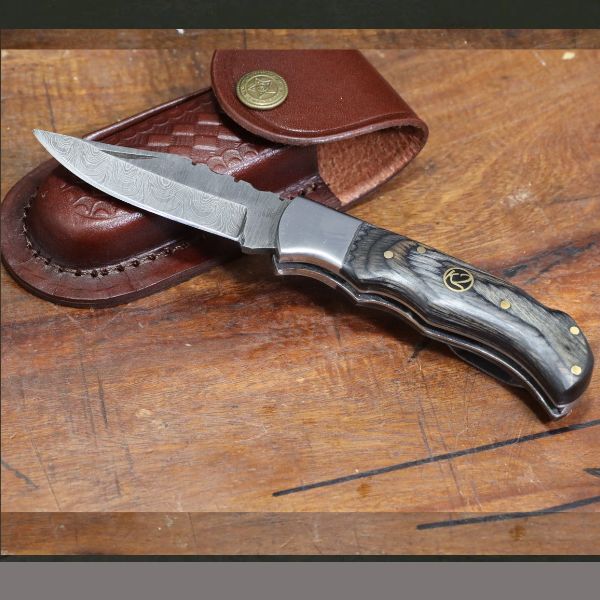 Dark handle folding knife