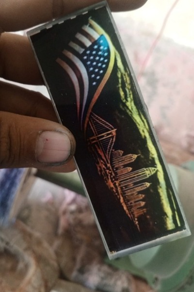 Raw resin insert: US flag over a city skyline